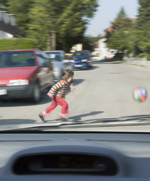 view-from-car-of-girl-running-into-street-after-ba-2026-01-11-09-44-39-utc
